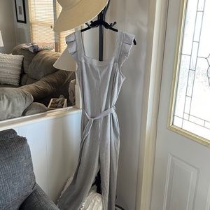 Grey and white striped jumpsuit size small